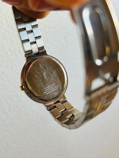 Yves Saint Laurent Vintage Round Watch with Gold-tone Accent