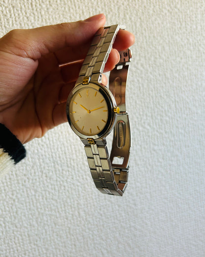 Yves Saint Laurent Vintage Round Watch with Gold-tone Accent