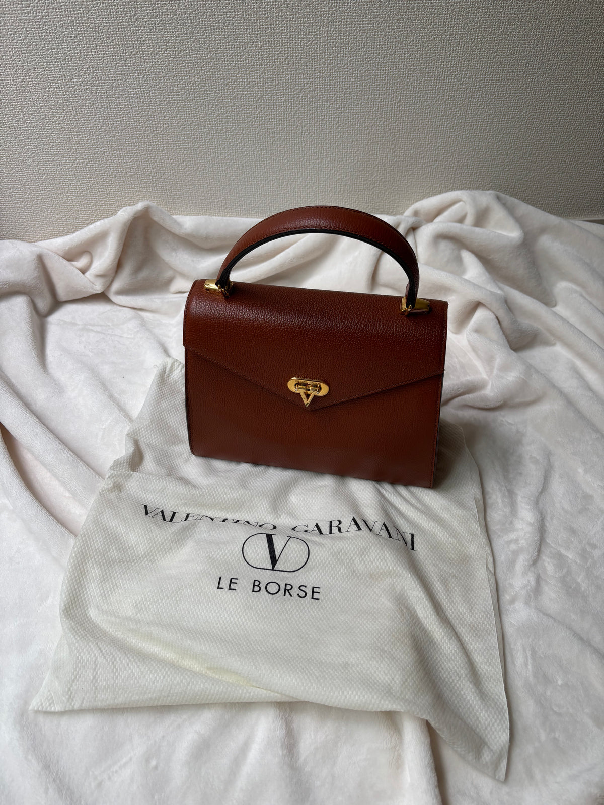 Valentino Garavani V Logo Flip Lock Hand Bag