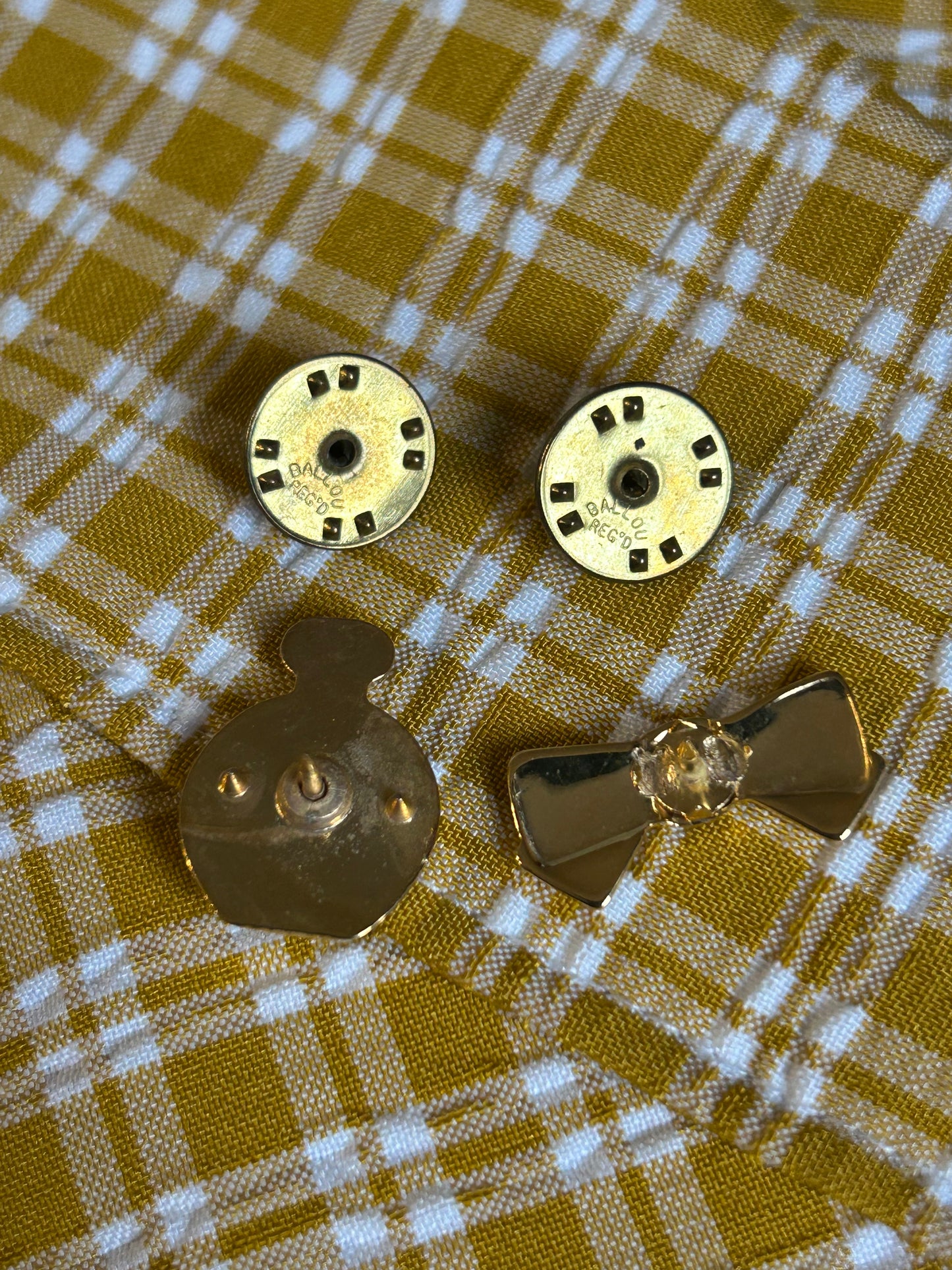 Nina Ricci Mini Bowtie and Perfume Brooch Set