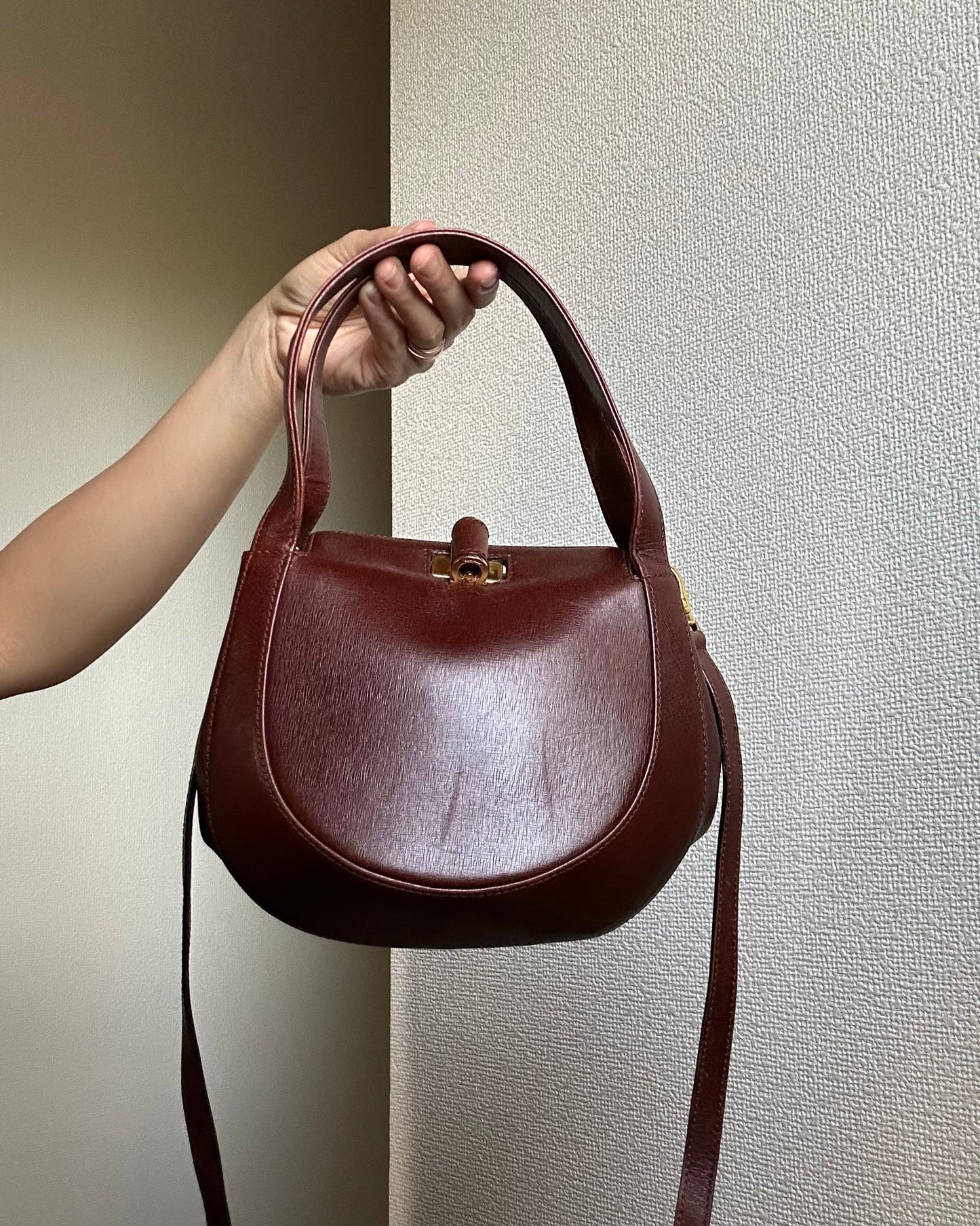 Salvatore Ferragamo Burgundy Three-way Round Bag
