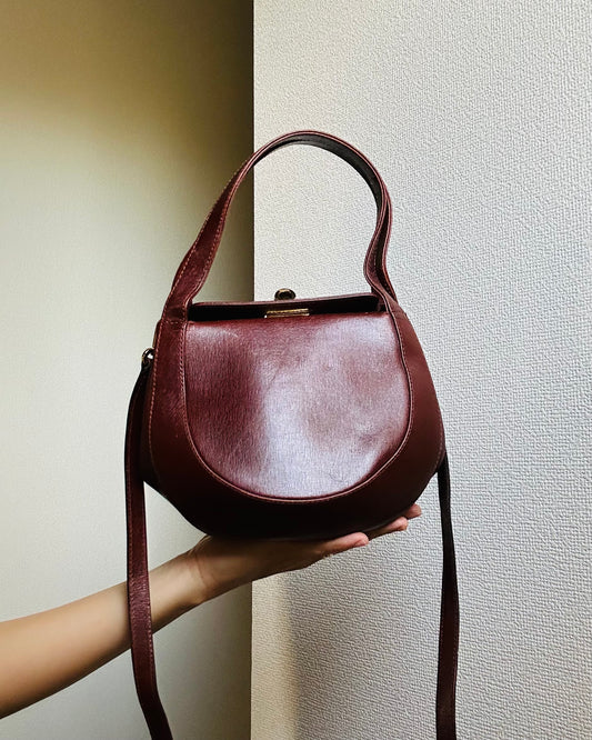 Salvatore Ferragamo Burgundy Three-way Round Bag