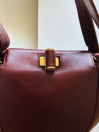 Salvatore Ferragamo Burgundy Three-way Round Bag