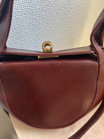 Salvatore Ferragamo Burgundy Three-way Round Bag