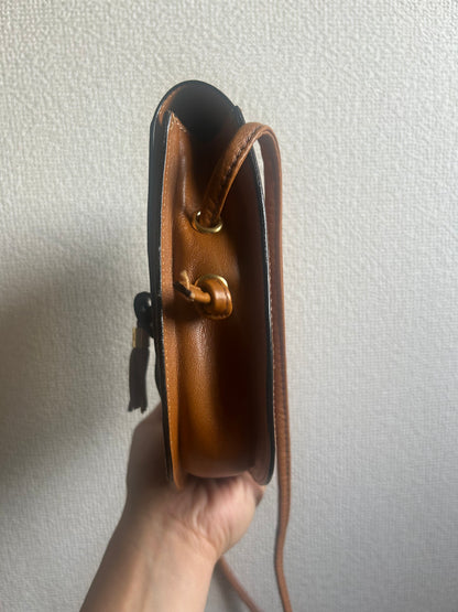 Bally Warm Brown Half Moon Tassel Sling