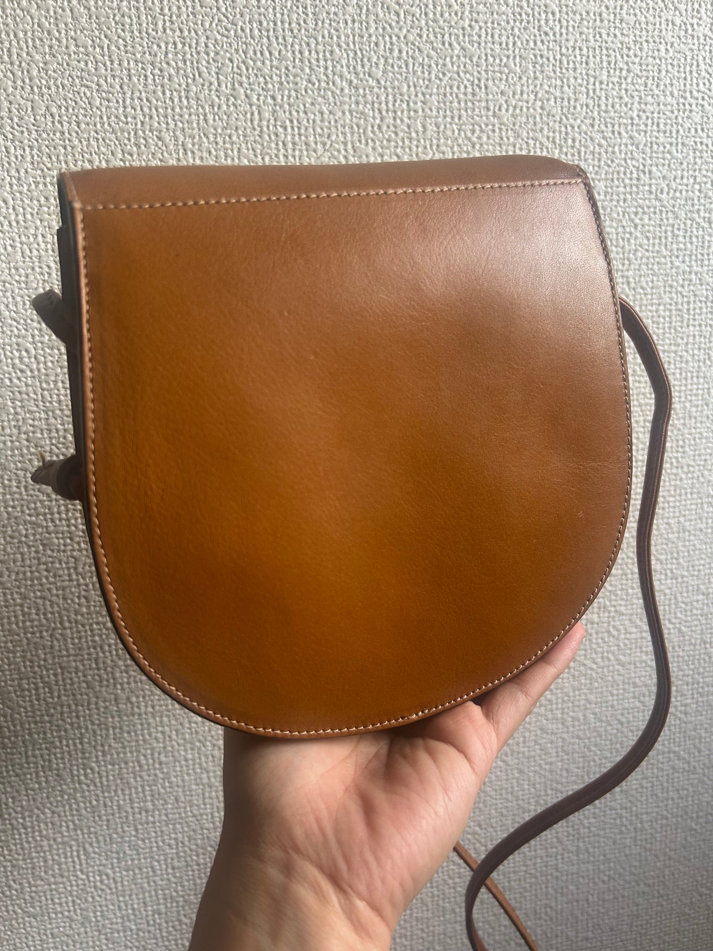 Bally Warm Brown Half Moon Tassel Sling