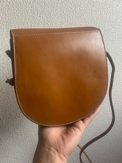 Bally Warm Brown Half Moon Tassel Sling