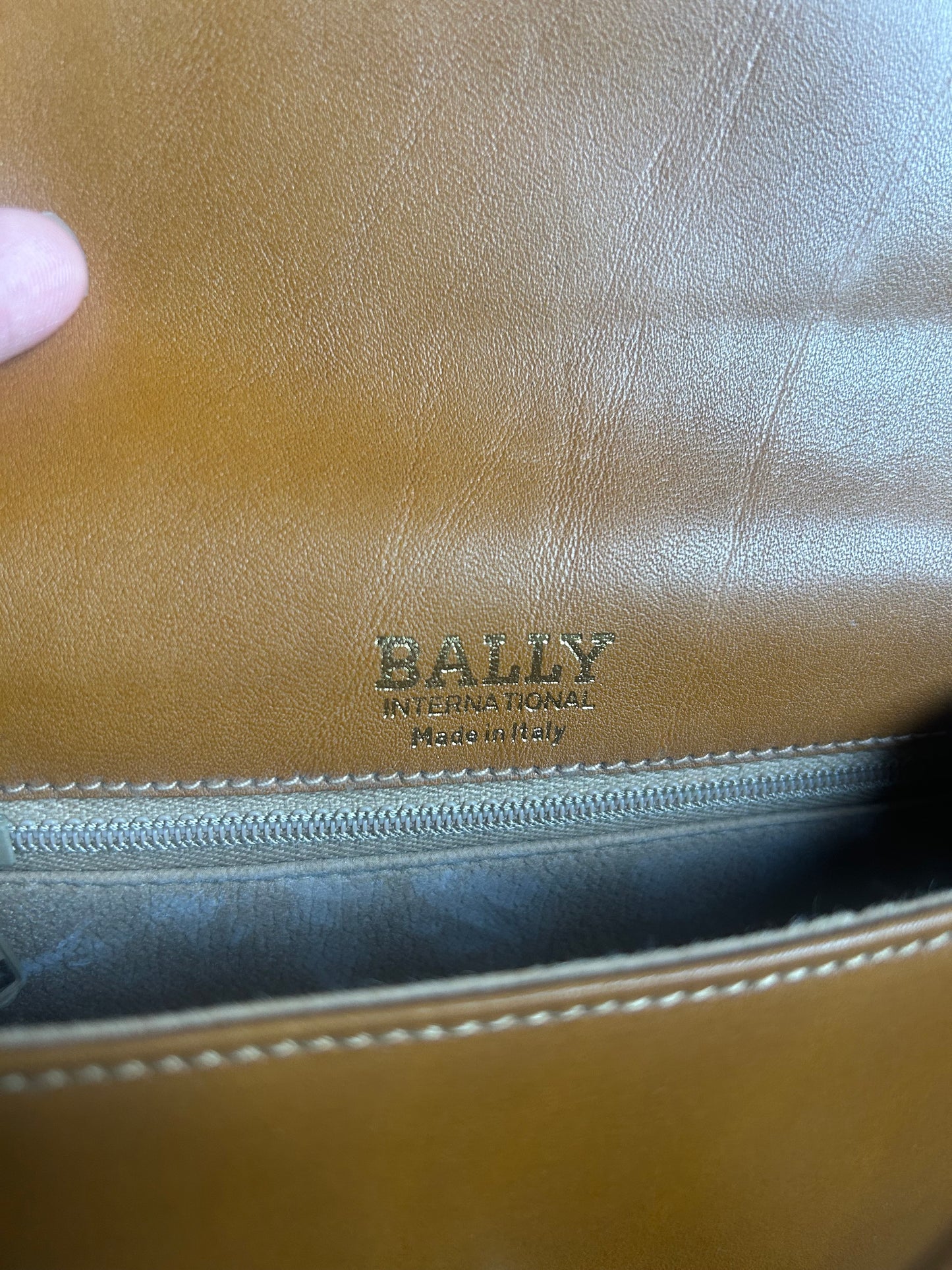 Bally Warm Brown Half Moon Tassel Sling