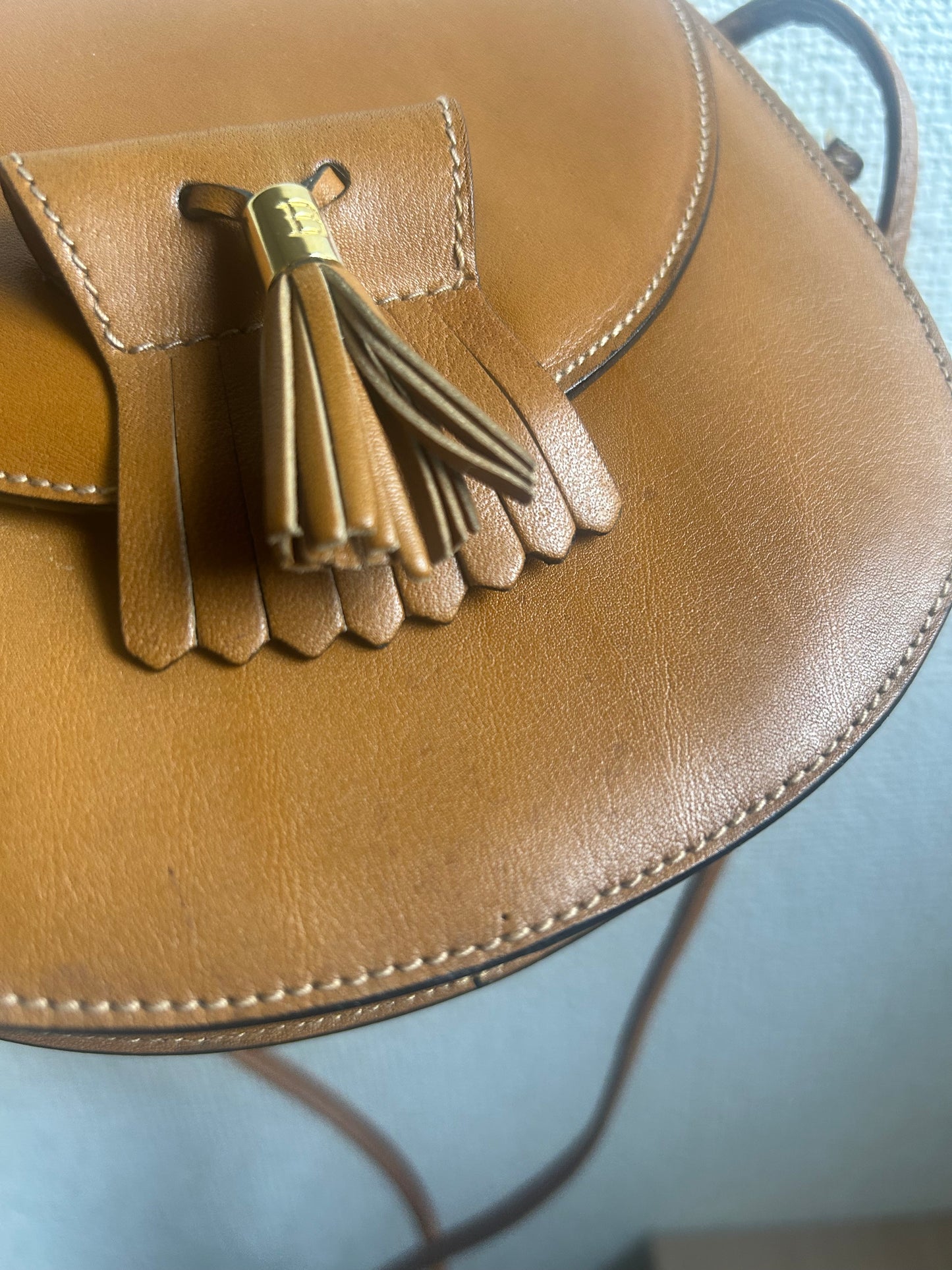 Bally Warm Brown Half Moon Tassel Sling