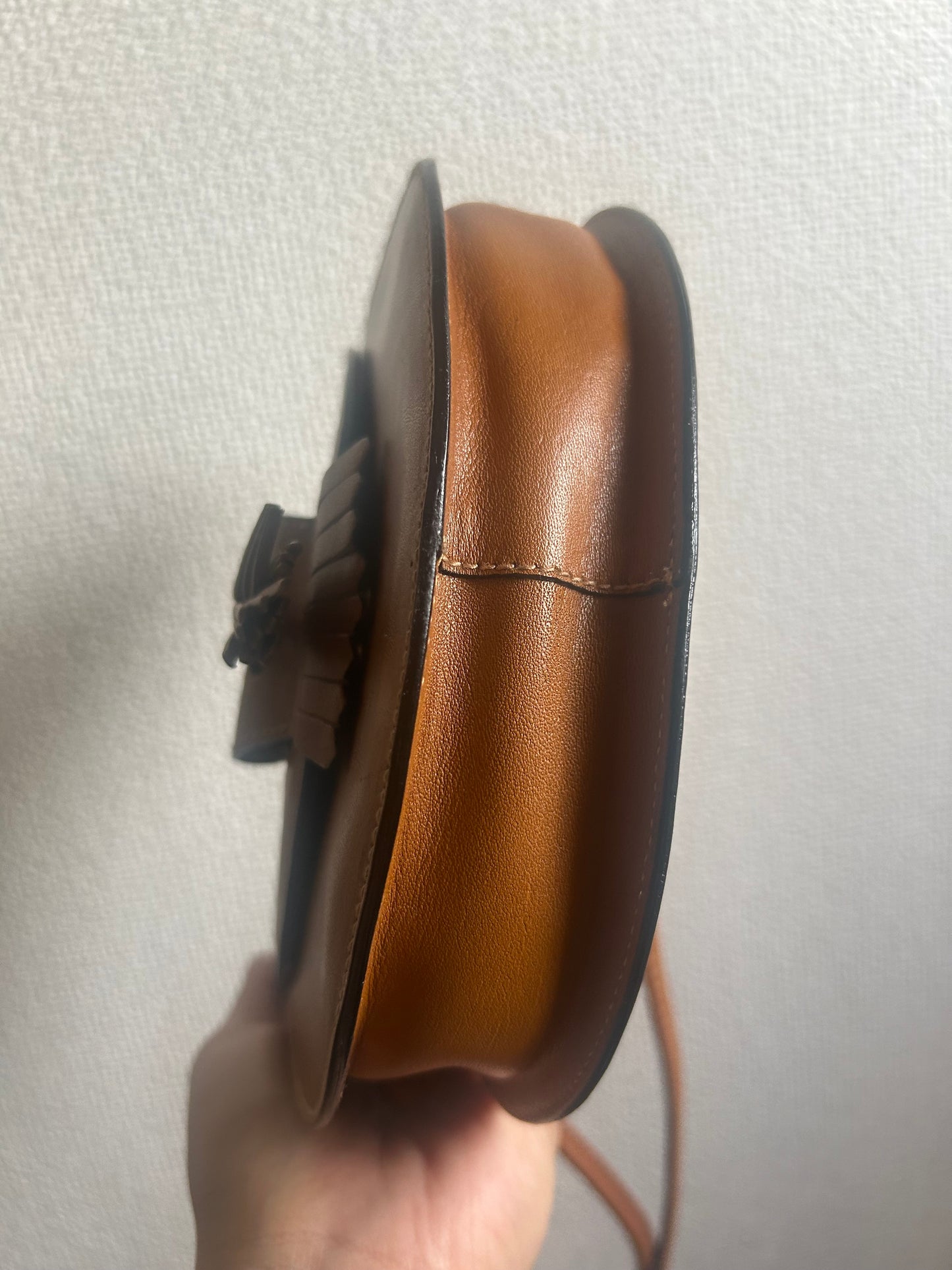 Bally Warm Brown Half Moon Tassel Sling